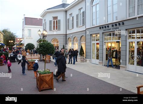 mcarthurglen gucci outlet.